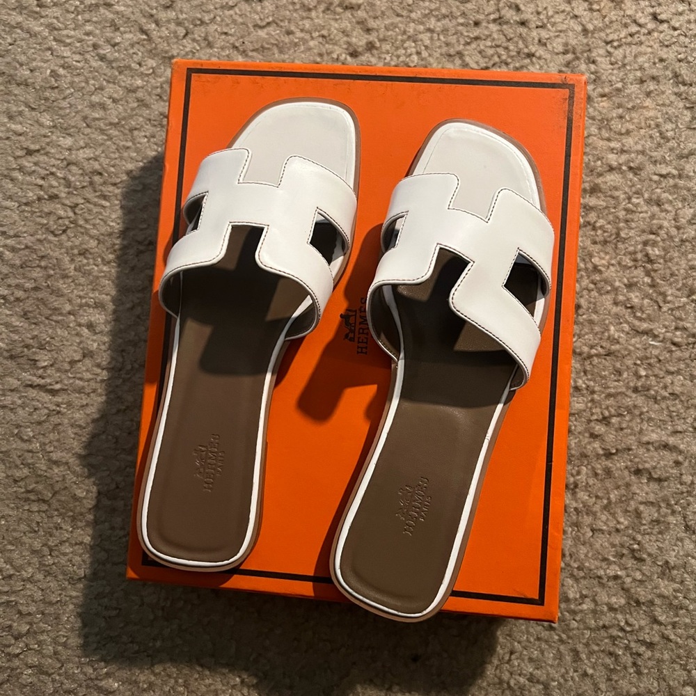 Hermes white sandals.